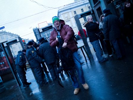 Perini coming out of the security in order to go to the red square during the big December protest in Moscow